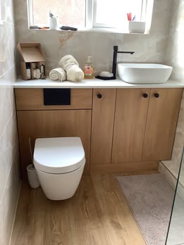 May be an image of sink, towel rack and indoors