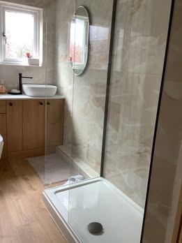 May be an image of towel rack, sliding door and indoors