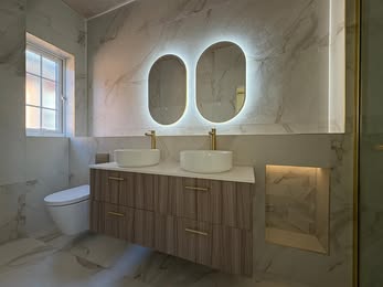 May be an image of lighting, sink and indoors
