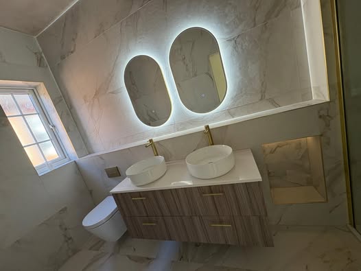May be an image of lighting, sink and indoors
